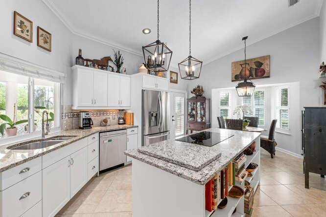 Live Oaks grace this beautiful Saddle Trail equestrian paradise, lending shade and tranquility to this 2 ac farm located in one of theequestrian world's most sought after neighborhoods.