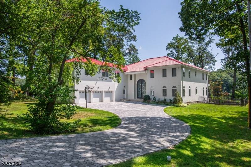 Welcome to this breathtaking, European inspired lakefront retreat built in 2021 and set on an enchanting, level 1.