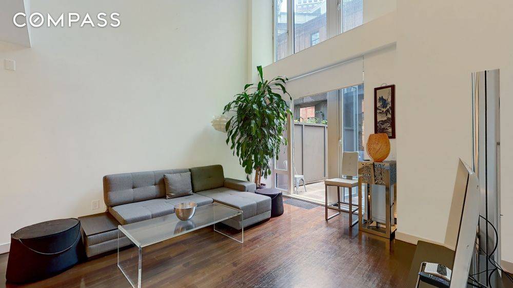This one bedroom, one and a half bathroom plus Dining Room duplex residence, measuring 1, 065 square feet, offers open airy living on two full floors.
