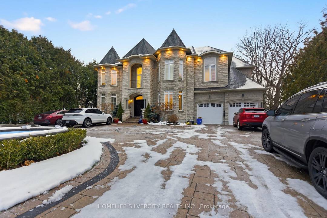 A truly One of a Kind Custom Luxury home, nestled on a ravine lot with lots of sunlight, just minutes from the beach.