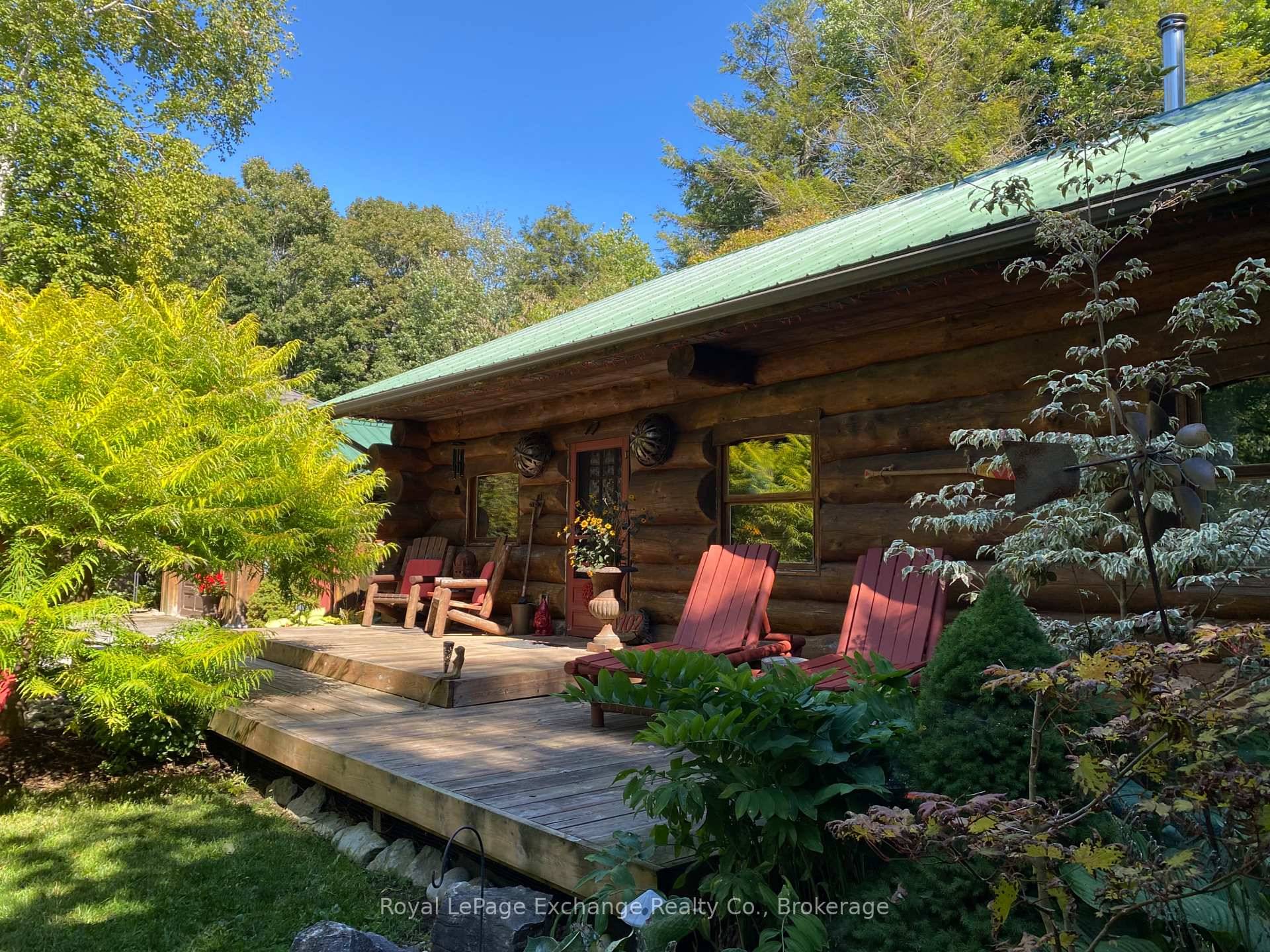 Authentic Scandinavian log cabin retreat near Lake Huron.