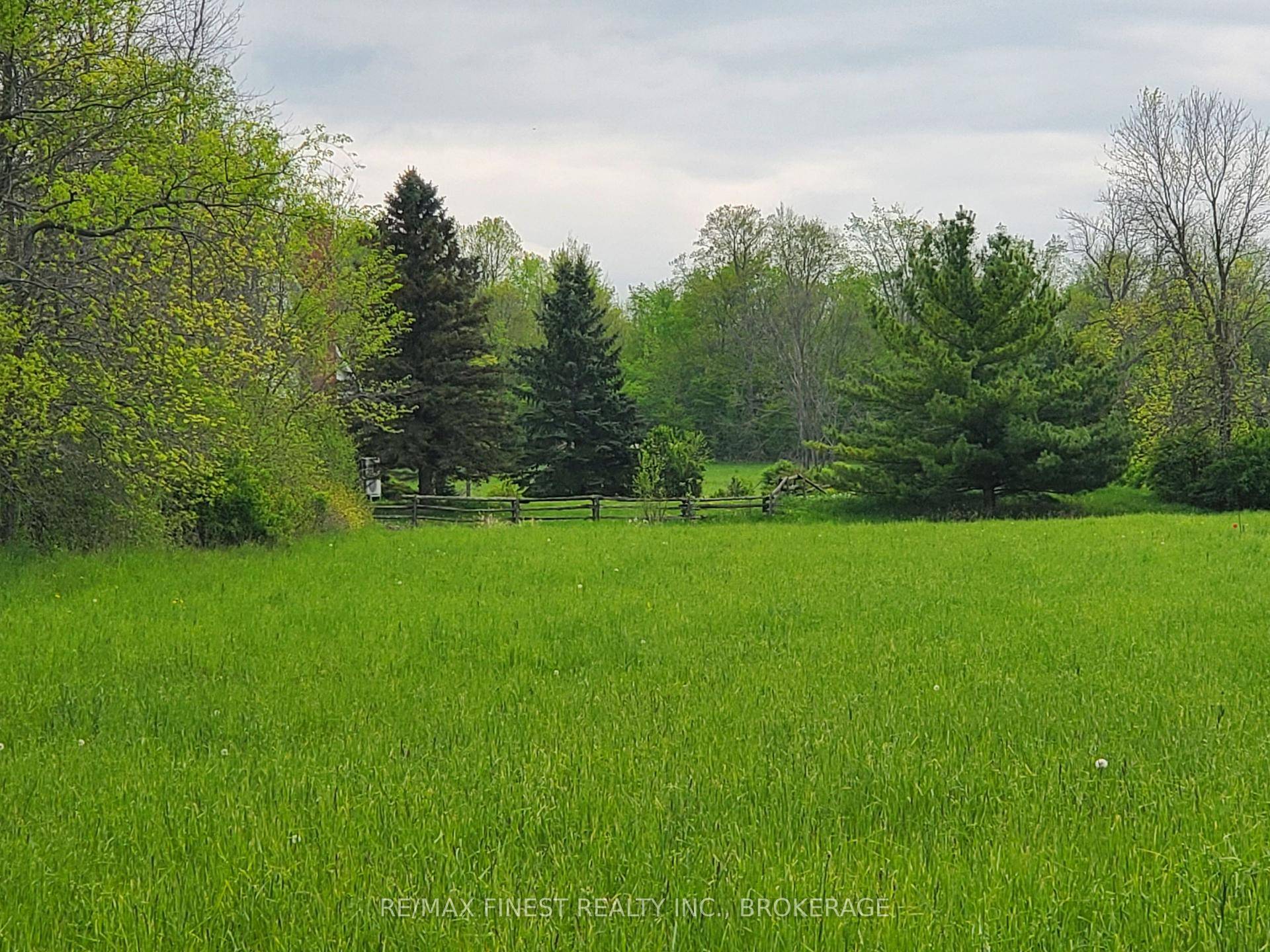 Build your countryside retreat on this lush 4 acre lot offering a blend of privacy 500 ft of road frontage and natural beauty, making the perfect canvas for your dream ...
