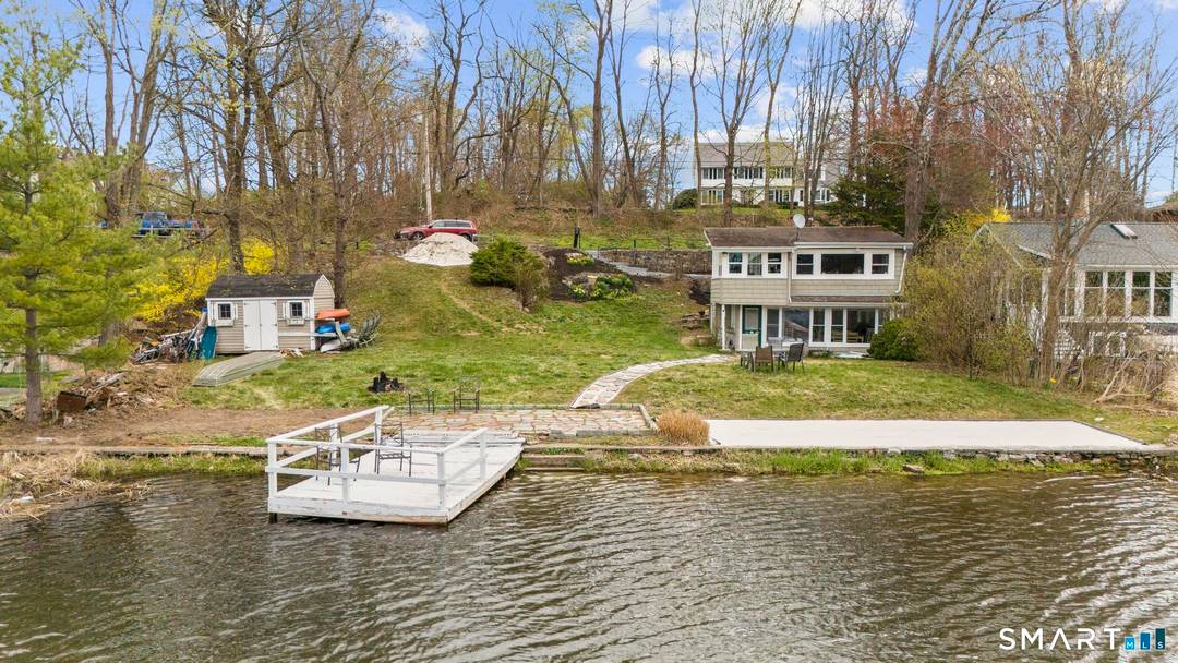Set directly on the shores of Ball Pond with its own private dock, 23 Ball Pond Road East offers a rare opportunity for true waterfront living in one of New ...