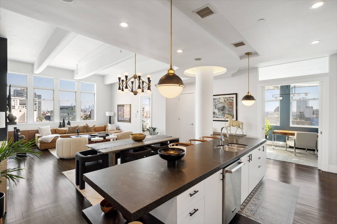 Welcome to 60 Broadway, Unit 8J a stunning loft condo that offers the perfect balance of luxury and practicality in the heart of Williamsburg, Brooklyn.