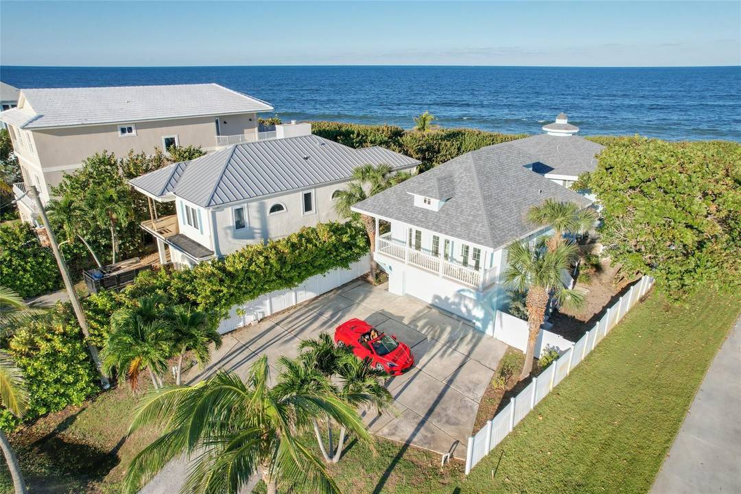 Experience the best of coastal living in this stunning ocean to intracoastal completely furnished turnkey property with dock.