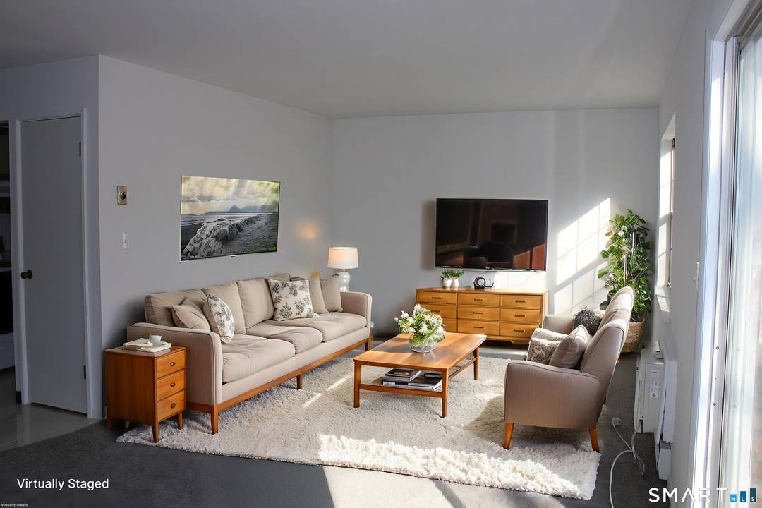 Welcome to this well maintained townhouse in the highly sought after Woodland Terrace community.