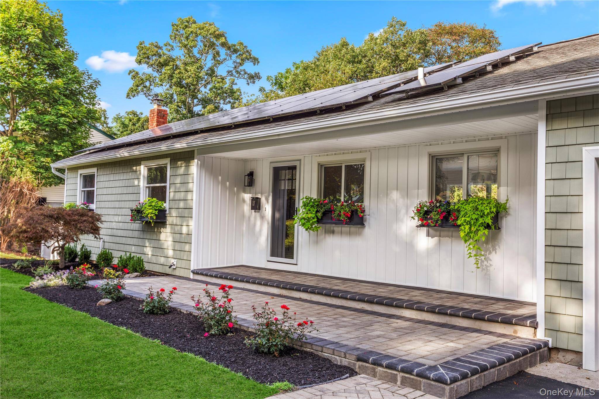 Welcome to your dream home in the heart of Bellport Village s Theater District !