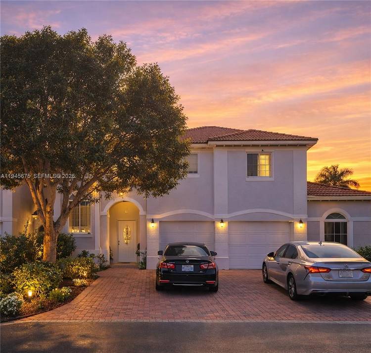 Charming two story home situated in a tranquil, gated community in the heart of Kendall.