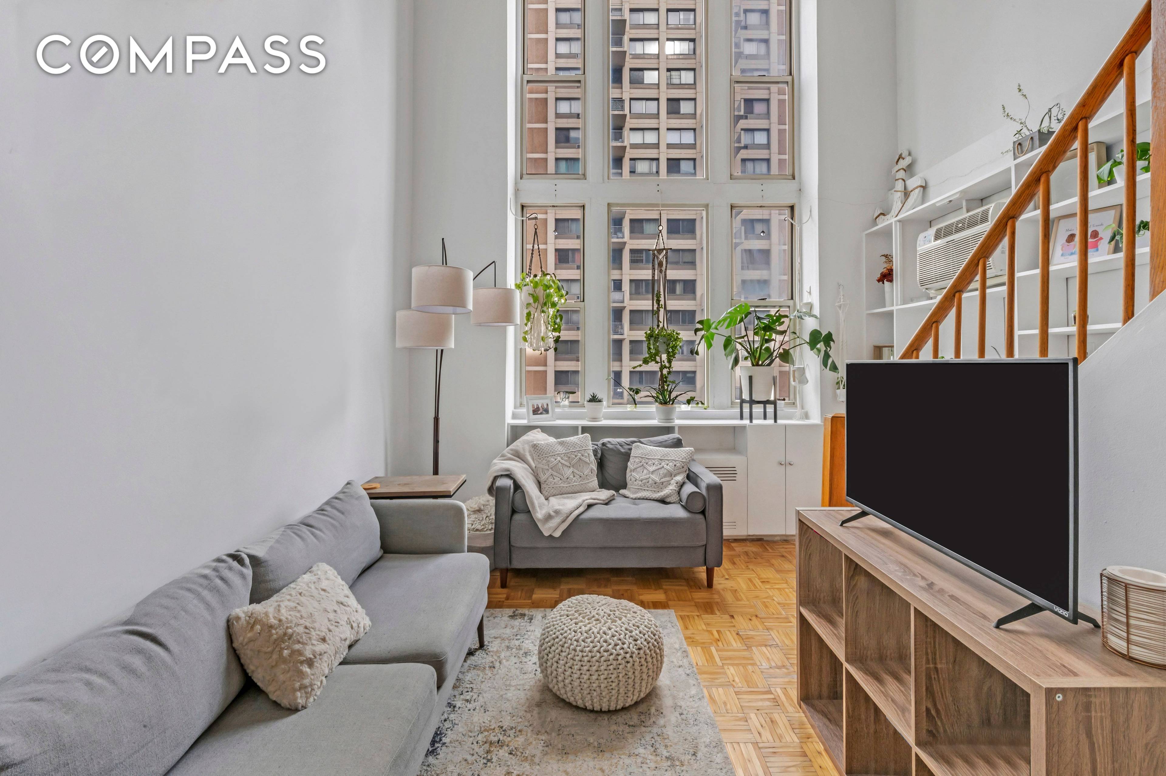 This one bed, one bath duplex is sprawling with sunlight and good vibes.
