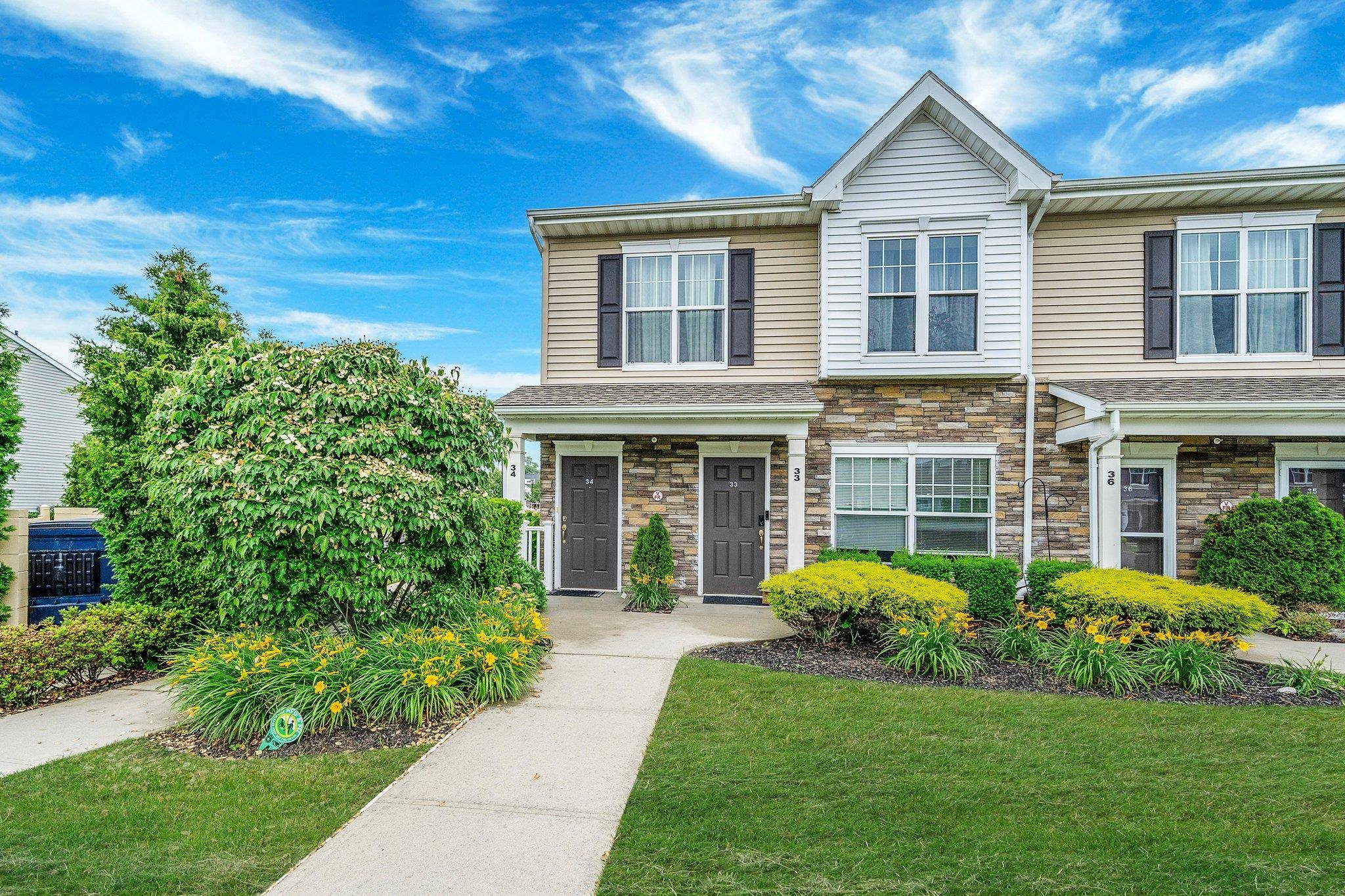 Welcome to this bright and spacious 2 bedroom, 2 bath upper level condo located in a gated community in the heart of Central Islip.