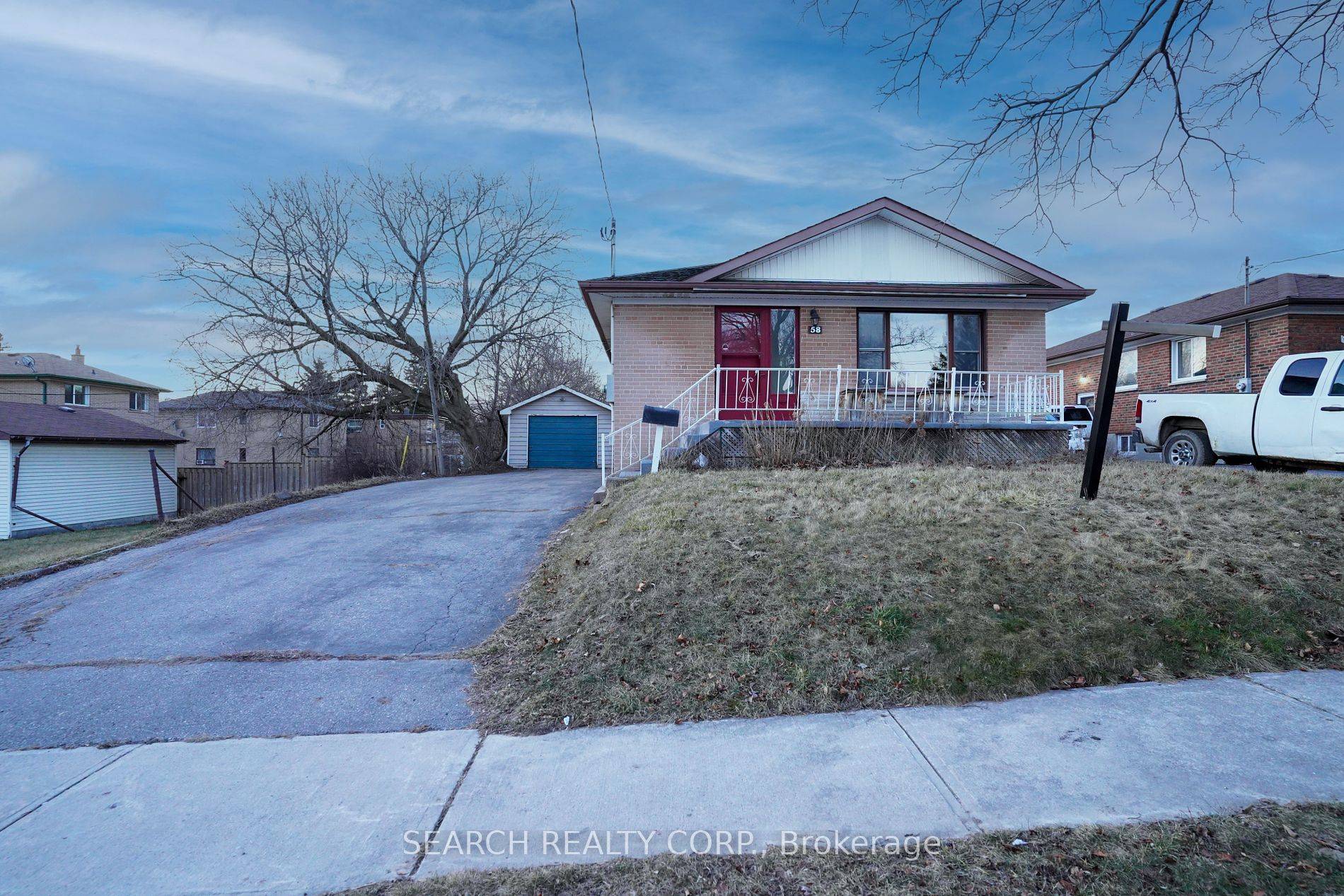 Nestled on a generous 50 x 179ft lot, this all brick bungalow presents an unparalleled opportunity for those with vision.