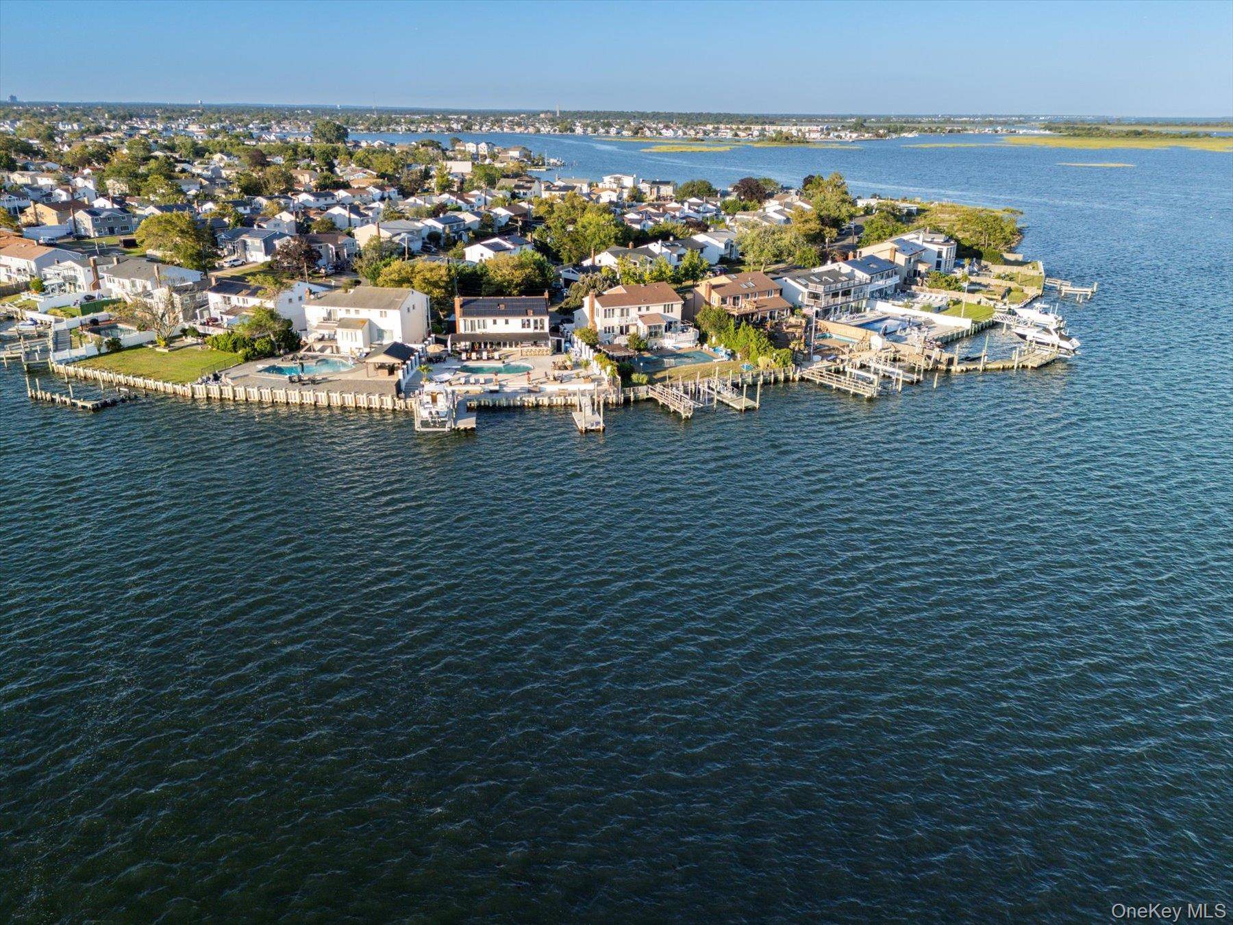 Welcome to one of Baldwin Harbor s most extraordinary waterfront properties an outdoor enthusiast s dream and a rare opportunity to own a truly one of a kind coastal retreat.