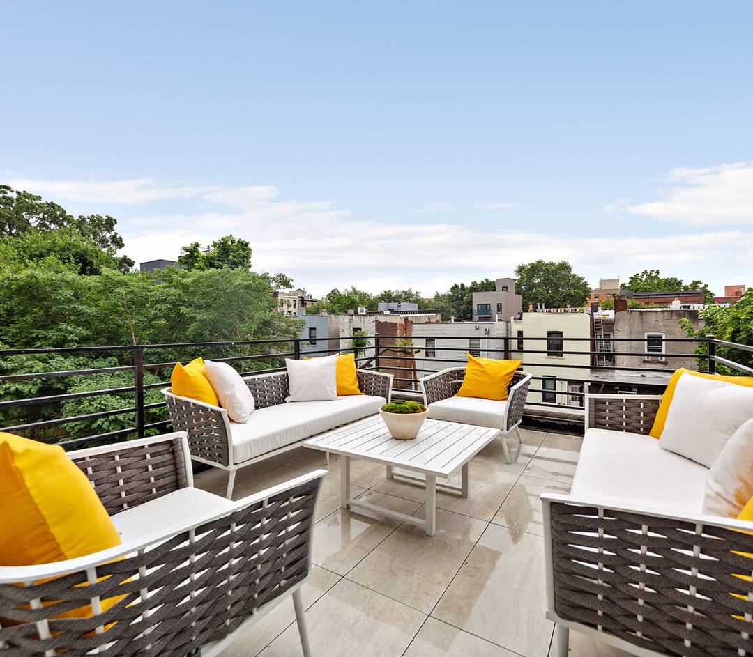 Introducing the top floor residence at 702 Greene Avenue, set within a classic four story townhouse with a refined, modern white facade on a quiet, tree lined block in Stuyvesant ...
