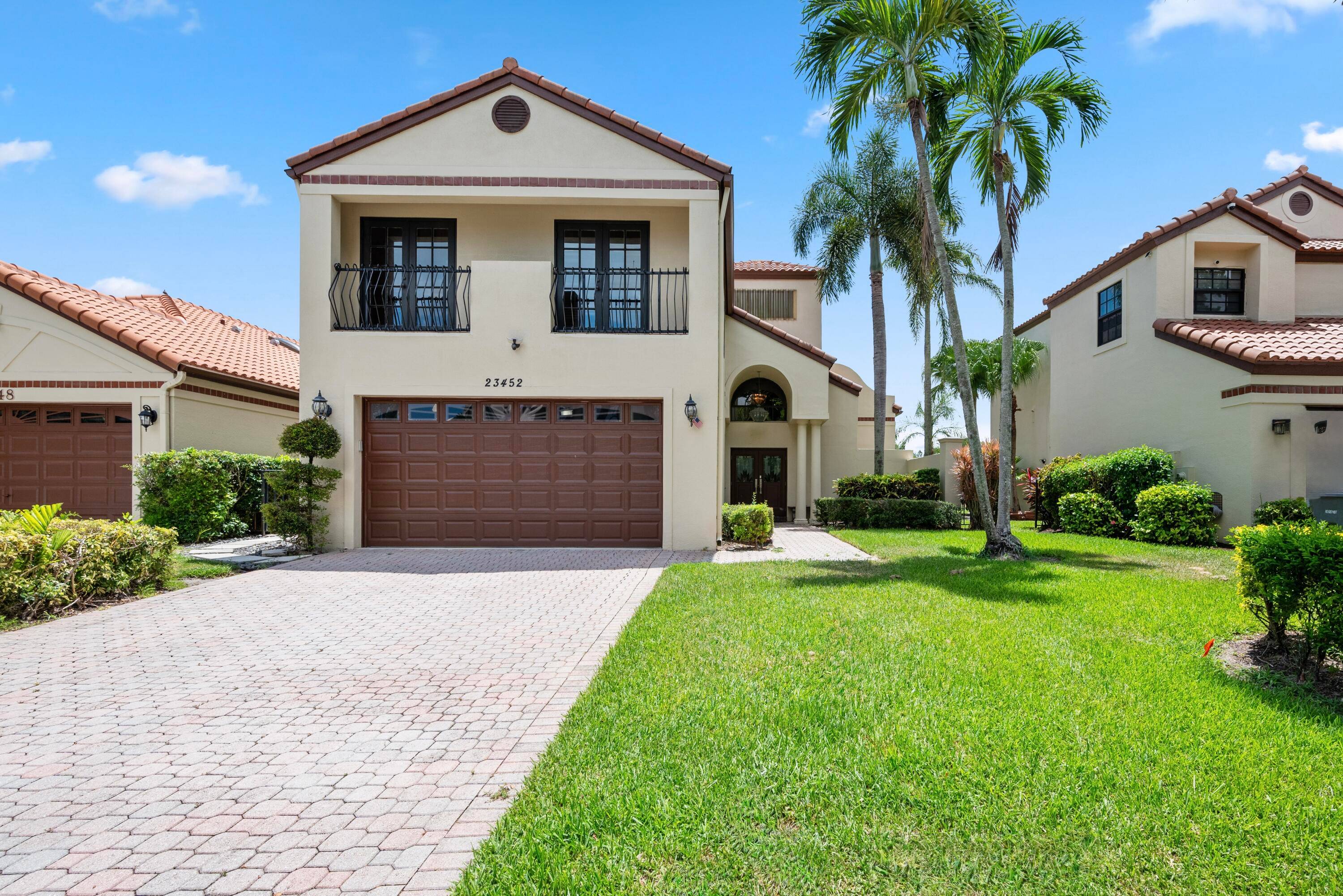 Welcome to 23452 Mirabella Circle South, an elegant waterfront oasis in sought after Boca Pointe, an optional country club community.