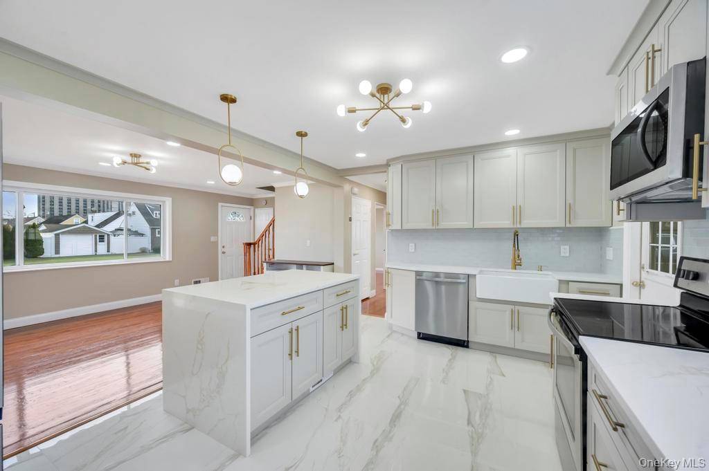 Welcome to 2127 Erma Drive, East Meadow, a 4 bedroom, 2 bath Cape with a basement and a practical, comfortable layout.