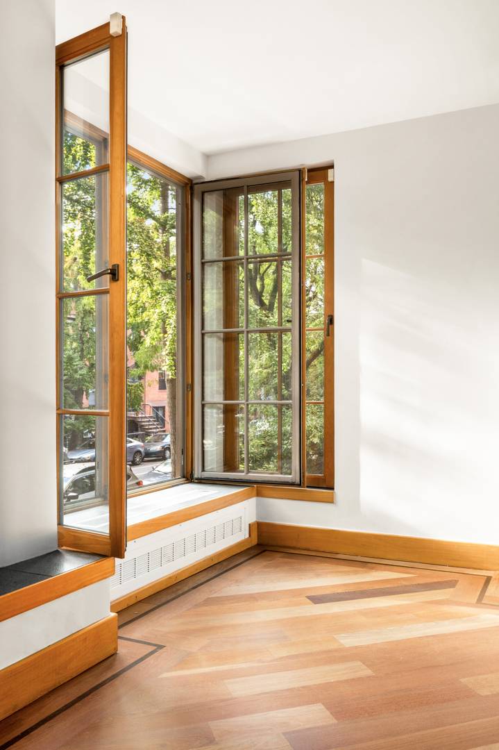 Just under 1, 600 square feet, Residence 2 at 237 Cumberland Street offers exceptional width, light, and privacy in an intimate four unit building.