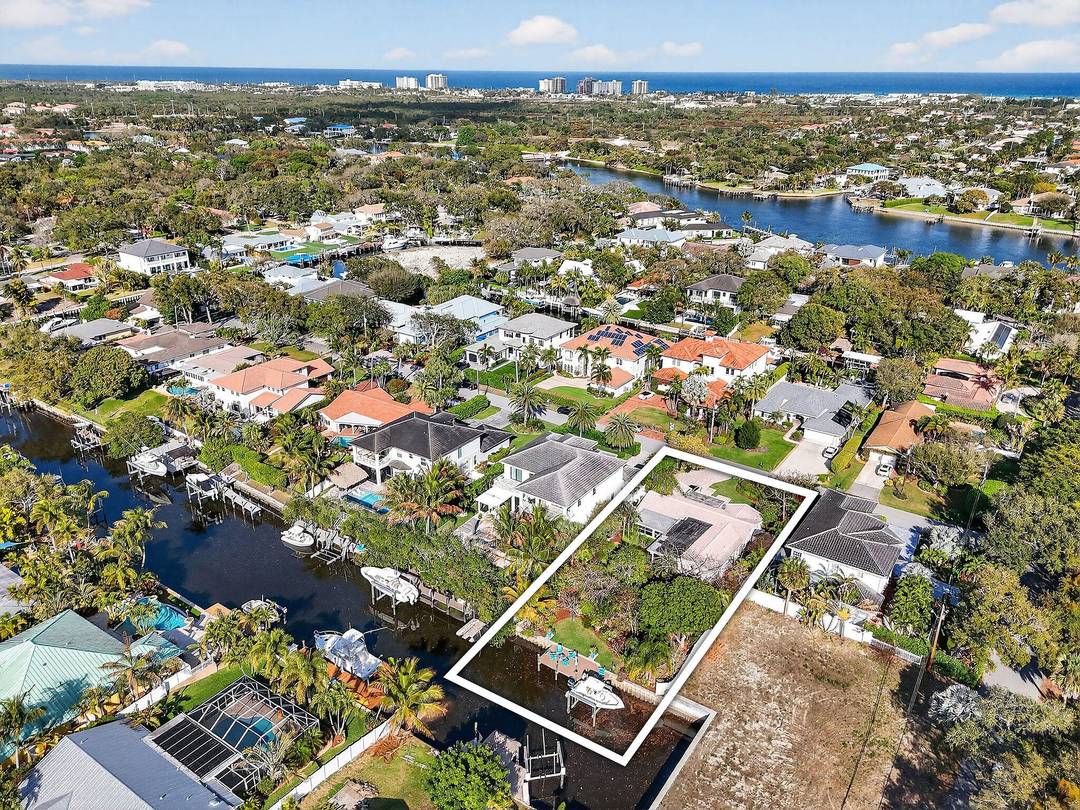 Welcome to a rare waterfront opportunity in one of the most desirable, quiet neighborhoods in Palm Beach Gardens with no HOA.