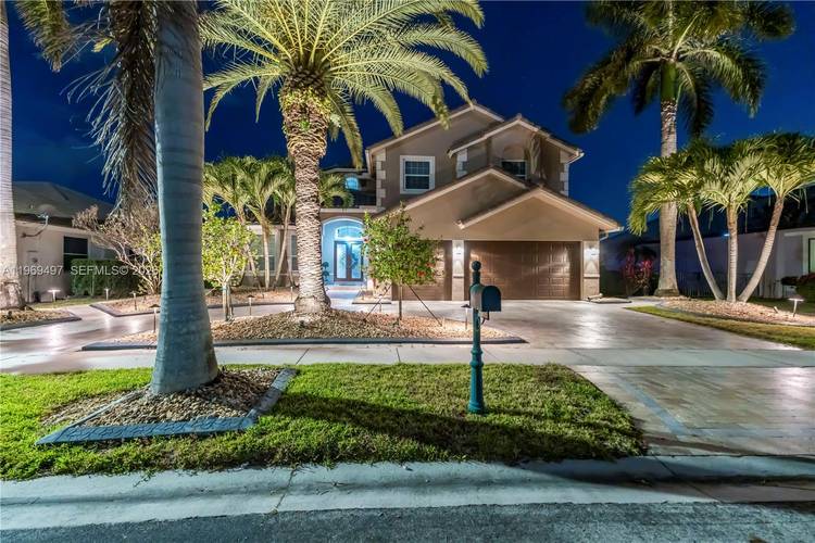 Lakefront pool home in the gated community of Sunset Lakes with nearly 500K in upgrades, including a NEW ROOF, full IMPACT WINDOWS amp ; DOORS, and a high efficiency Lennox ...