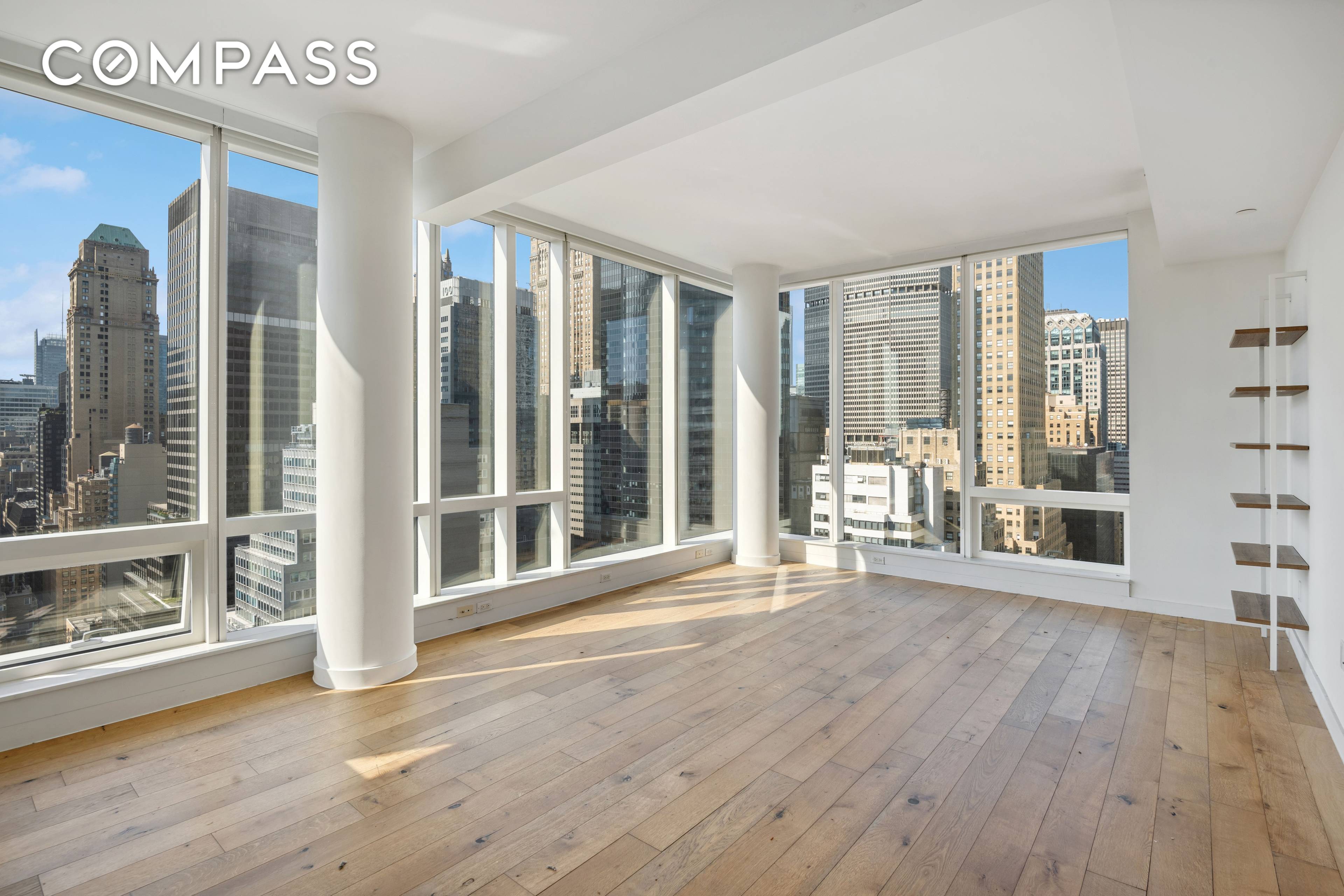 Occupying the entire western wing of the building, this exquisite two bedroom residence boasts abundant natural light, captivating sunset views, and panoramic vistas of the cityscape.