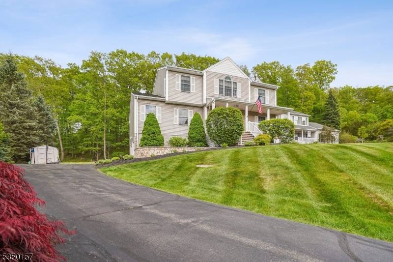 Located in a prime Lake Hopatcong neighborhood, this home offers 3 finished levels, 4 bedrooms, and 2 full plus 2 half baths.