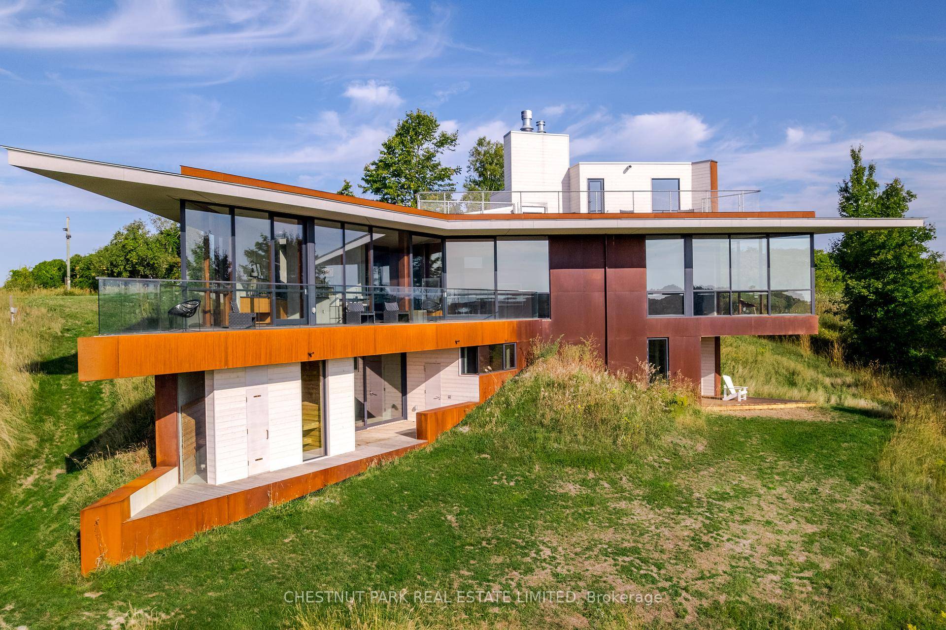 The Brillinger House. Architecture and nature harmonize in a magical setting with this stunning 2024 build, designed by Adam Thom.