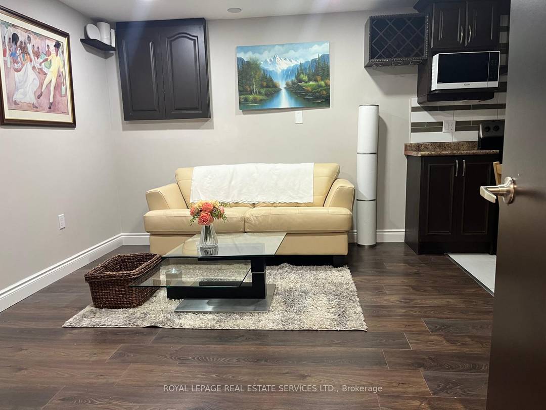 Beautifully renovated and furnished basement apartment with a separate entrance, situated in the highly sought after John Fraser and St.