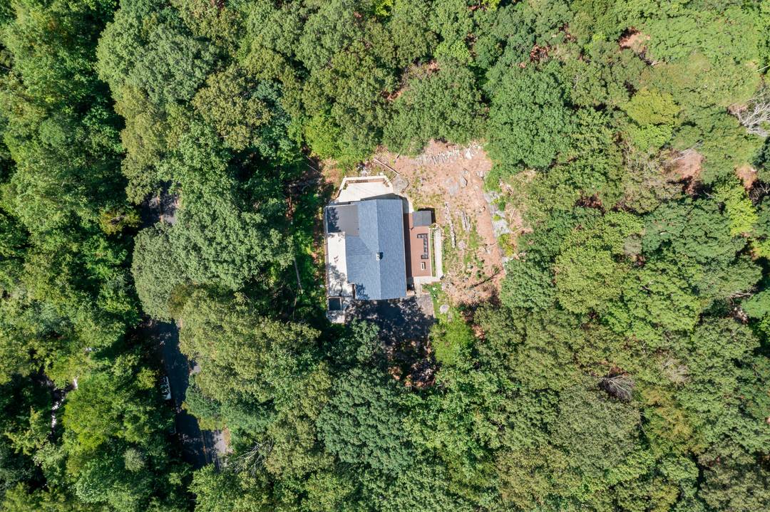 Set on over 3 wooded acres in Lower Easton, 125 Buck Hill Road is a spacious, character rich ranch offering privacy, flexibility, and potential.