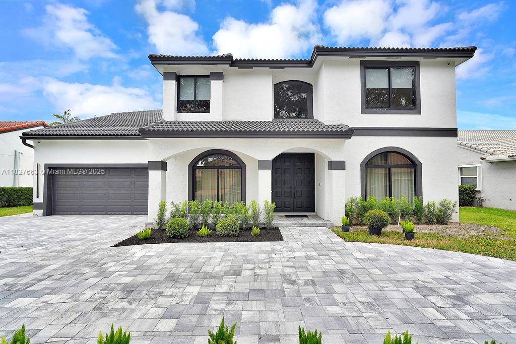 Rare Opportunity ! the Ultra Modern Residence Is Situated in Cooper City s 24 Hour Gated Community, Embassy Lakes.