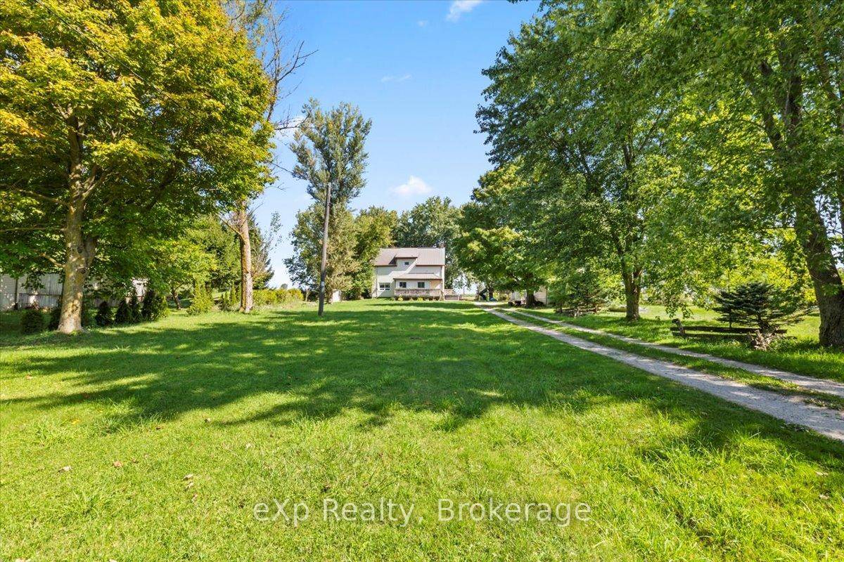 Beautifully updated century farmhouse on 1.
