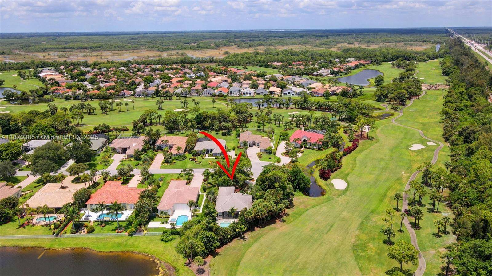Welcome to a rare opportunity in the highly sought after boutique golf community of Ironhorse in West Palm Beach, offering the luxury of country club living without mandatory membership fees.