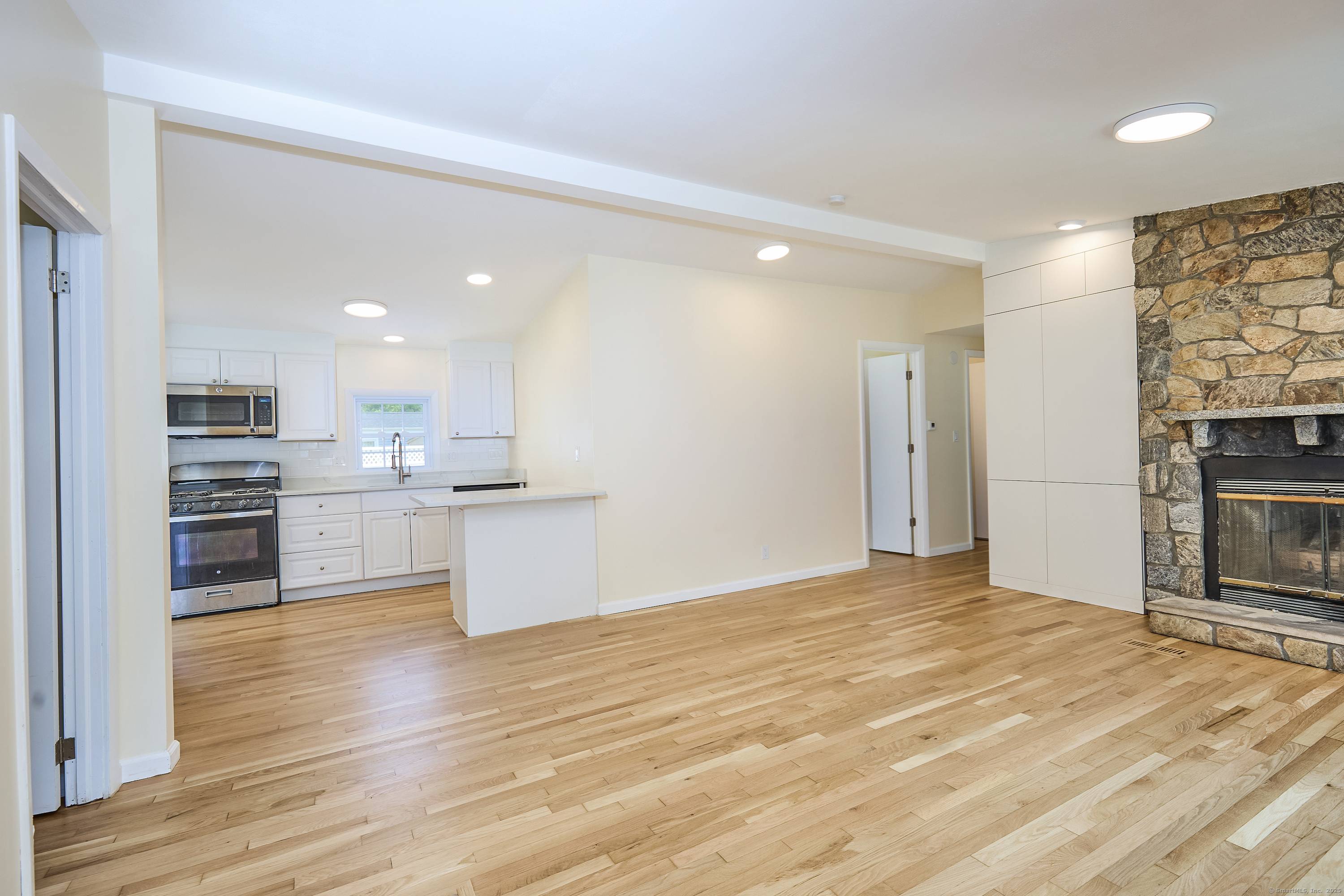 Immediate occupancy ! New home purchase, downsizing or investment income, a complete renovation awaits in your 4 bedroom, 2 full bath home featuring open living dining area with fireplace, custom ...