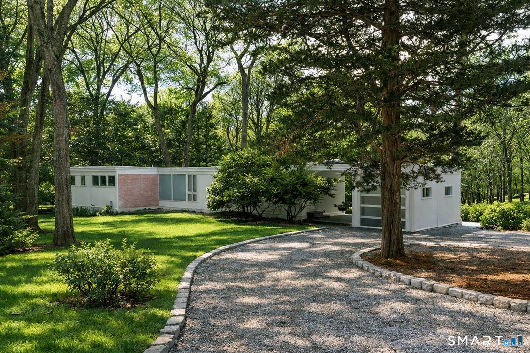 The Oasis at Richmond Hill is a rare mid century modern retreat nestled at the end of a quiet cul de sac in Weston.