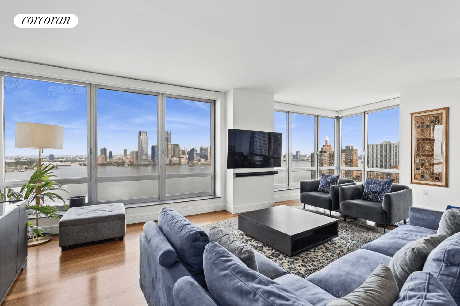 River Views Galore ! High floor, corner 3 bed 3 bath home has 9 foot ceilings, wraparound floor to ceiling windows and unparalleled views of the Statue of Liberty, Hudson ...