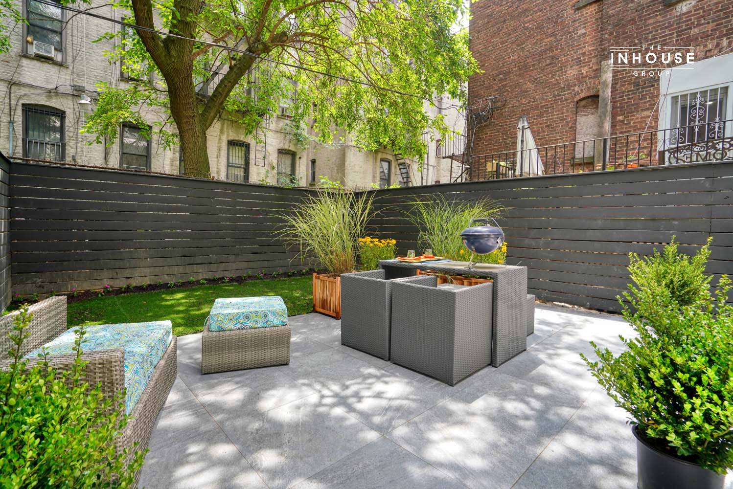 Introducing a Remarkable Duplex Condo with a private backyard in the Heart of Historic Crown Heights !