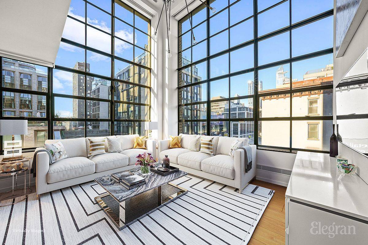 The distinctive charm of this corner duplex begins with its impressive 20ft double height ceilings.
