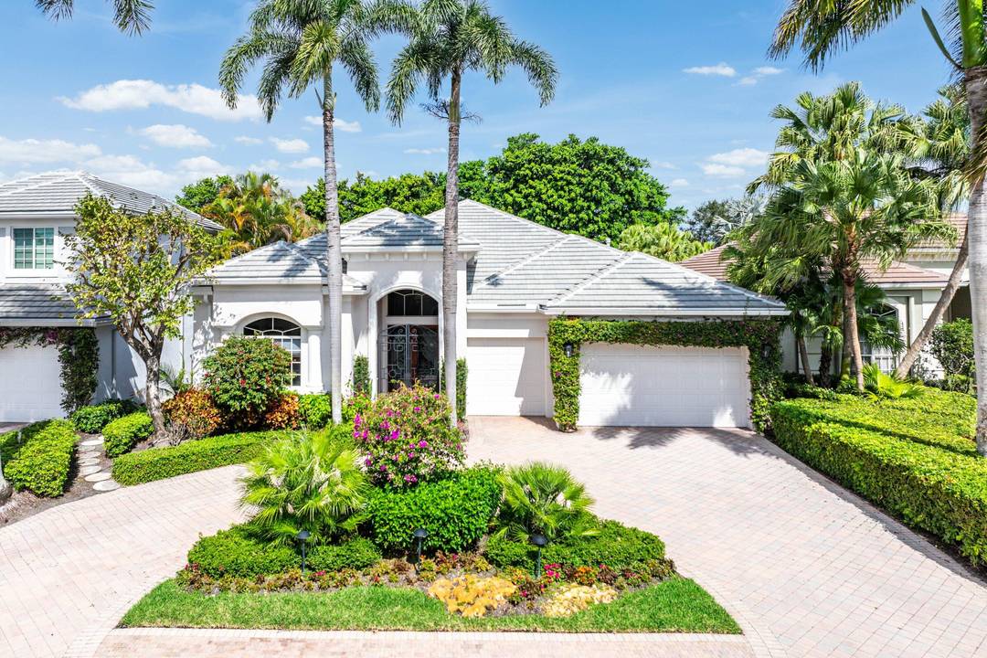 Exceptional single story residence available in Ballenisles, offering over 4, 100 sq ft of living space.