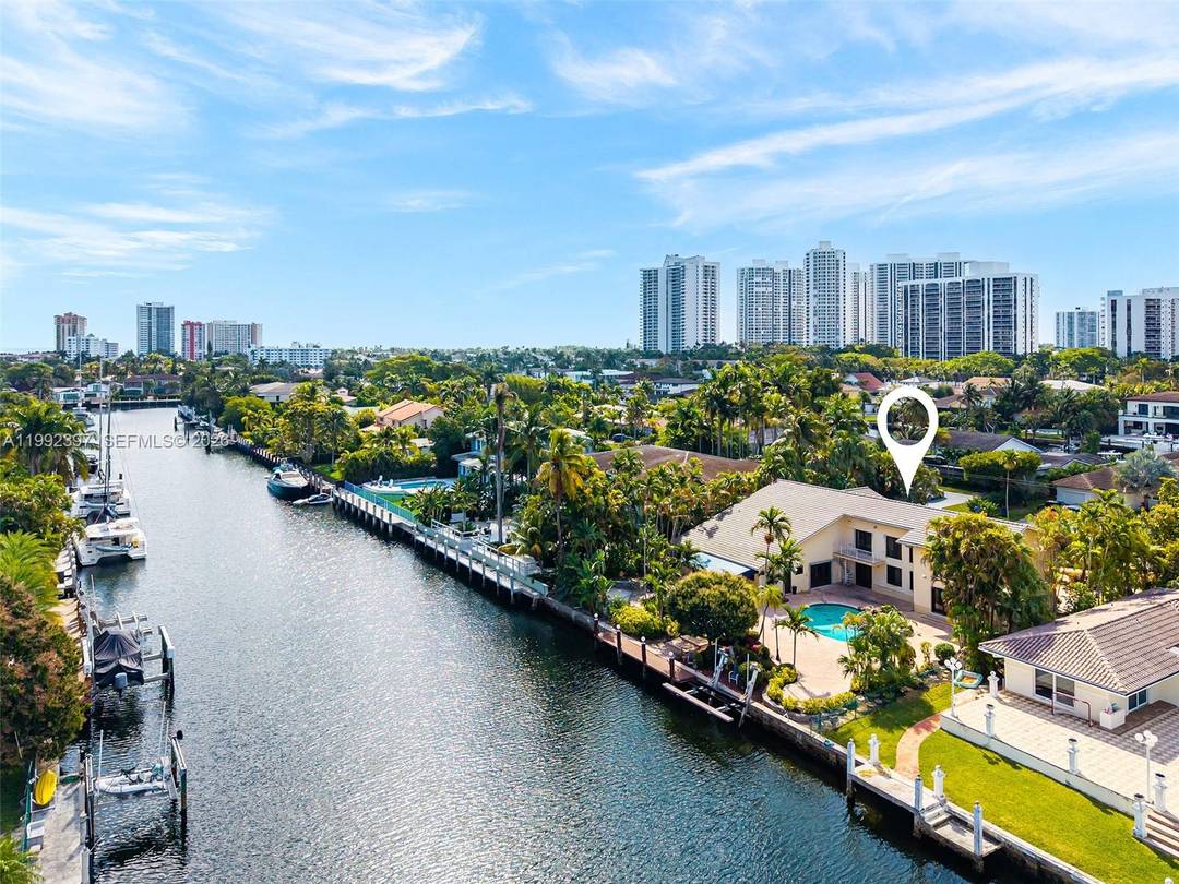 Two story waterfront home in the gated waterfront community of Golden Isles, situated on a 100 x 150 lot on a quiet cul de sac street with, one of the ...