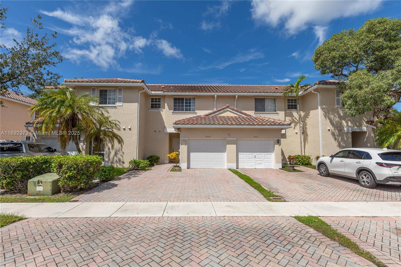 Beautifully renovated 3 bedroom, 2 1 2 bath townhome with a brand new roof, lake view, and 1 car garage.
