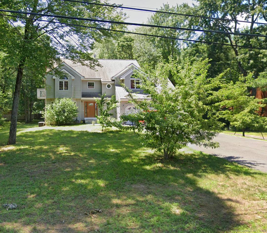 Beautiful Colonial in a quiet dead end street, surrounded by nature with 4 acres.