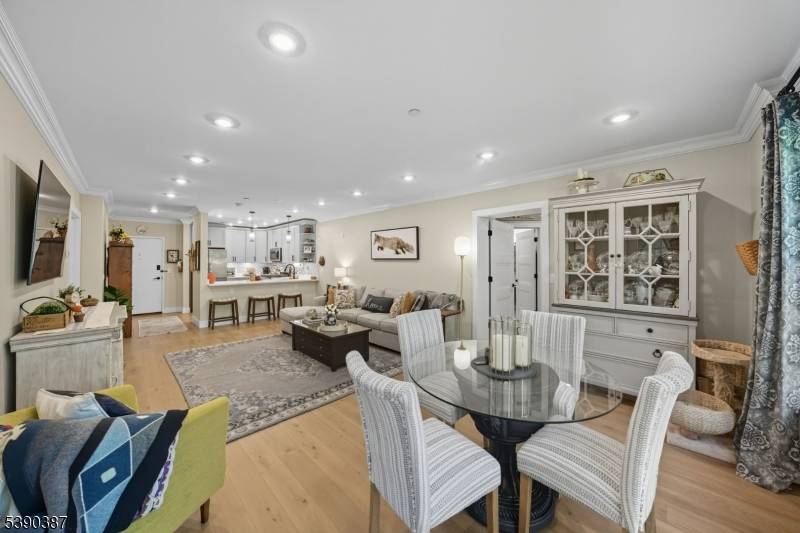 Experience easy living in this beautifully maintained second floor residence within the gated Fox Hill community.