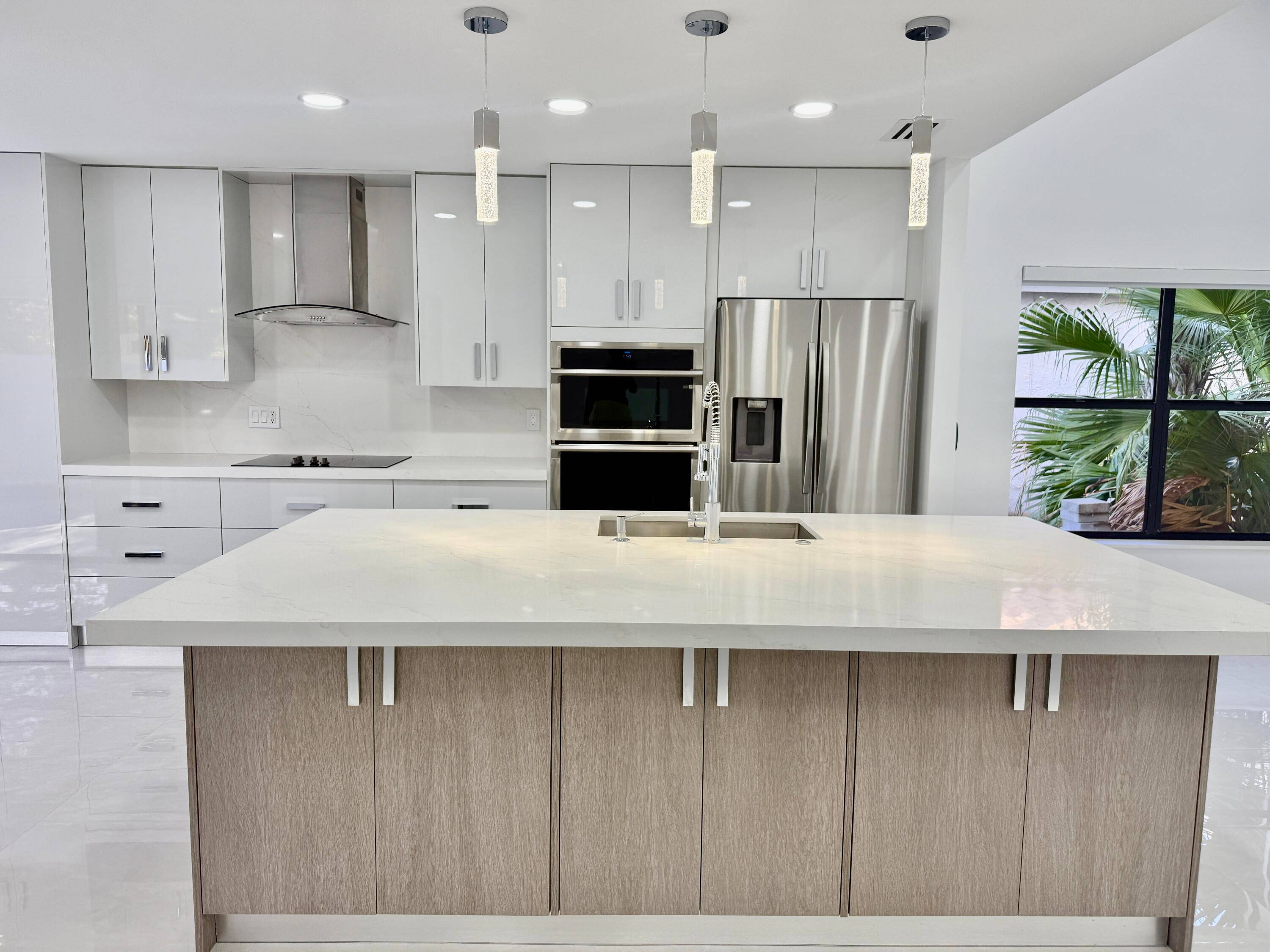 Stunning light and bright modern renovated home with gorgeous lake views, large screened in patio with salt water system pool spa, grand open floor plan, newer stainless steel appliances, quartz ...