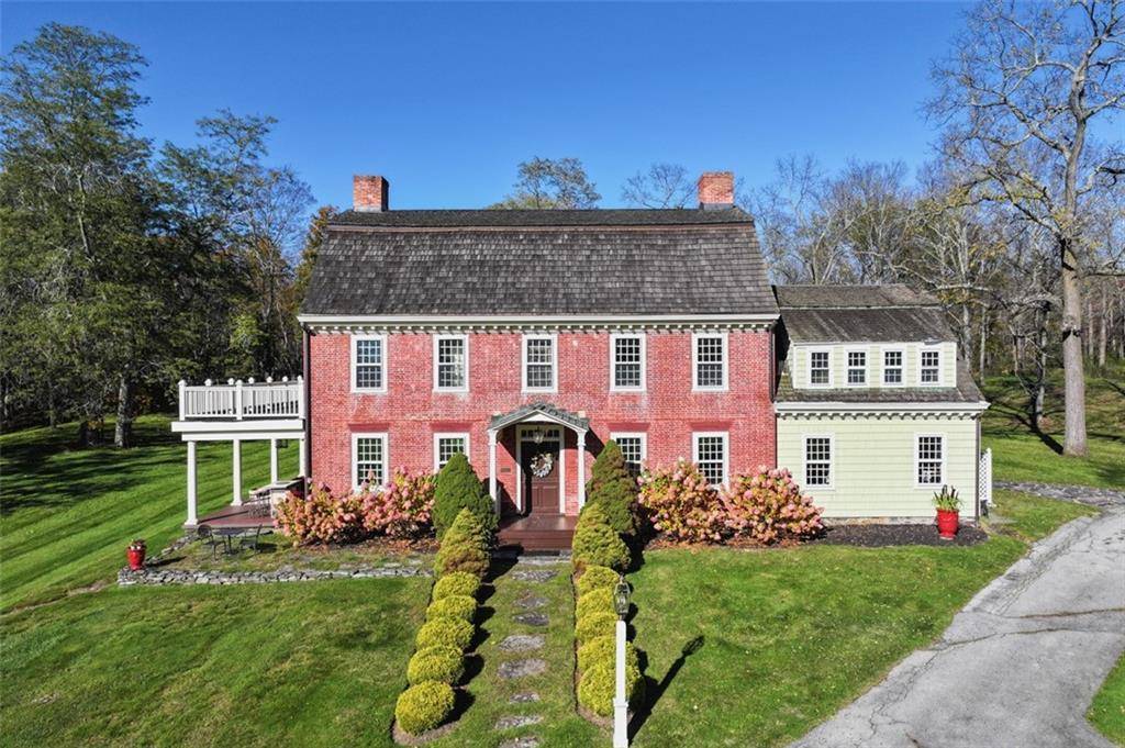 Step back in time without sacrificing modern comforts in this rare, historic brick farmhouse estate, originally built in the 1760s by early settler Sarah Tobias Newcomb.