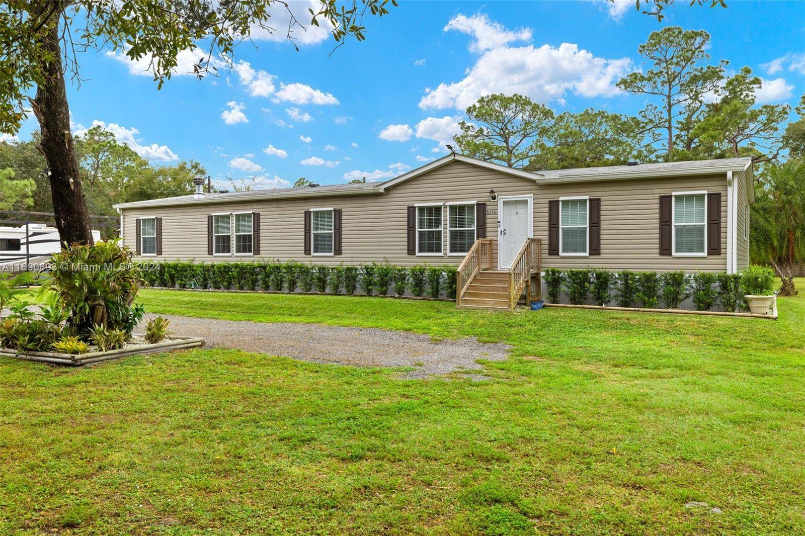 THIS BEAUTIFUL 7. 5 ACRES OF PRIVATE AND SECLUDED LAND WITH GATED ENTRANCE IN THE COUNTRY.