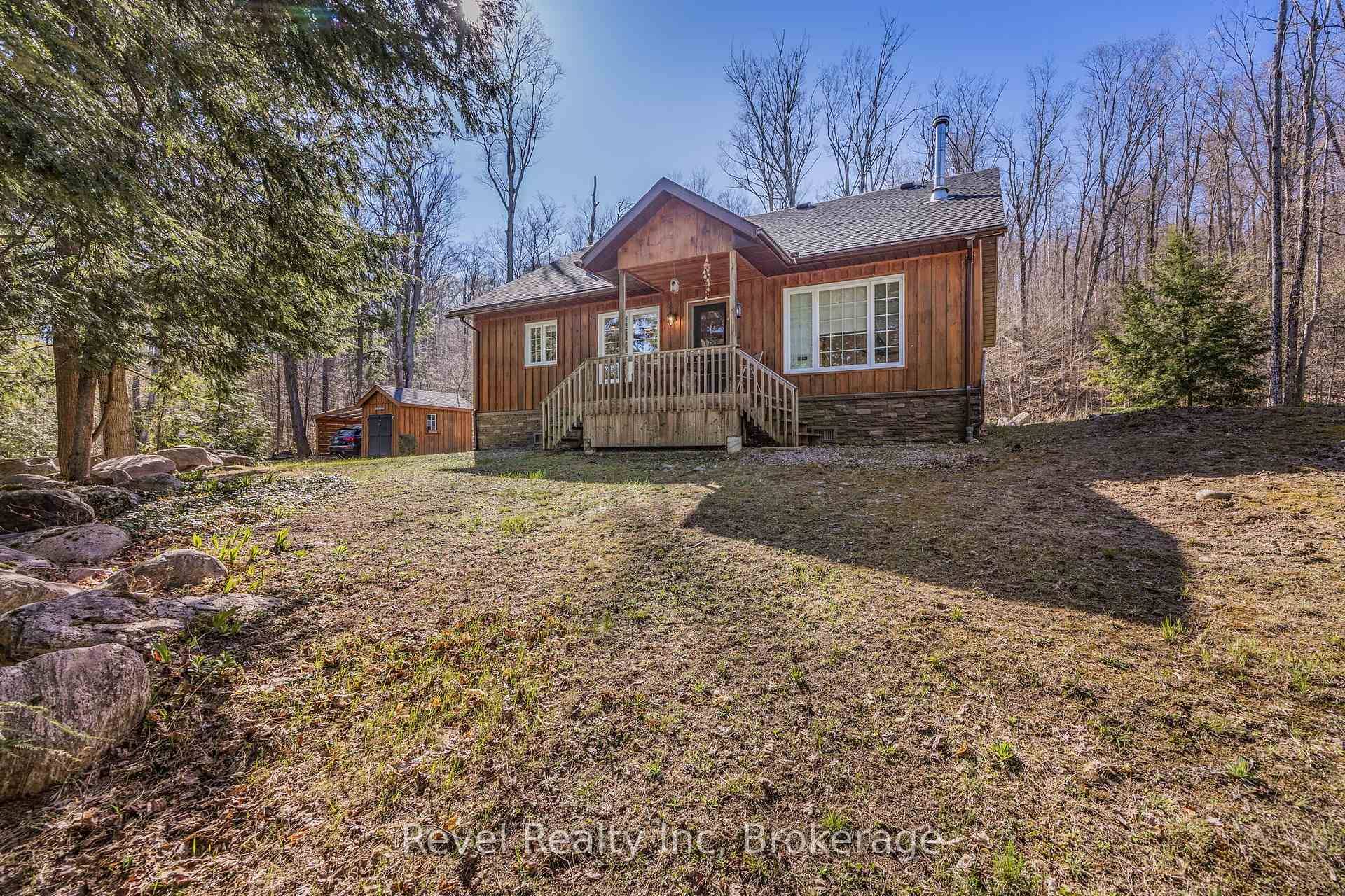 Tucked into the trees in a sought after area, this stylish 2 bedroom chalet style home offers the perfect blend of simplicity, privacy, and natural beauty.