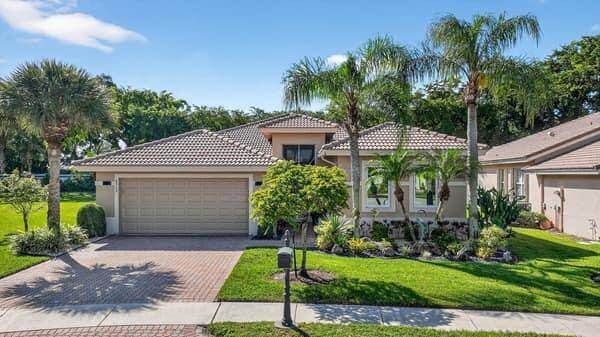 Stunning desirable, this 4 BR 3 full bath home is the largest model in the fabulous 55 community of Venetian Isles.