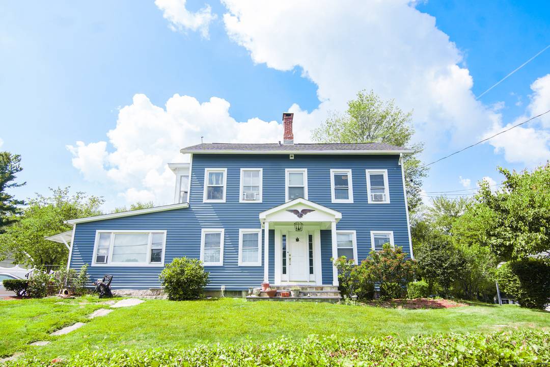 Step into this beautifully updated Colonial style home featuring 3 bedrooms and 2 additional spaces that are currently been used as bedrooms with their own entrance, perfect for guest or ...
