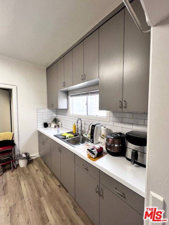 1225 S Normandie Ave 7BR La