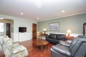 YOUR SEARCH ENDS HERE ! Move right into this beautifully maintained end unit in Volley Court, Glenbrook s premiere condo complex !