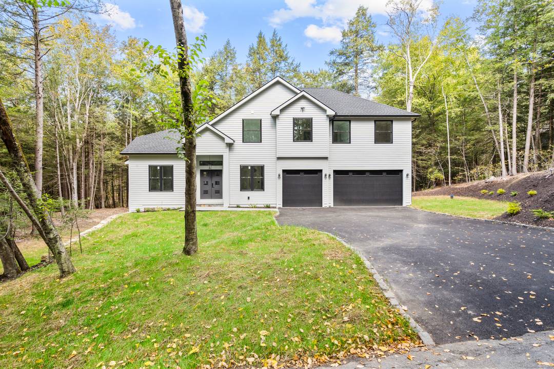 Welcome to 68 Paxton Court, a stunning new construction completed in 2025 and tucked on a quiet cul de sac in the Woodridge Lake community.