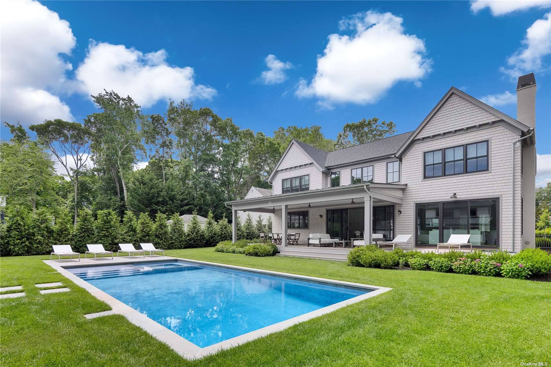 This 5, 300sqft. new construction transitional masterpiece is the quintessential Hamptons home located in Bayview Oaks, a Southampton waterfront community with access to Peconic Bay.